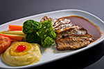 Roasted duck in orange sauce